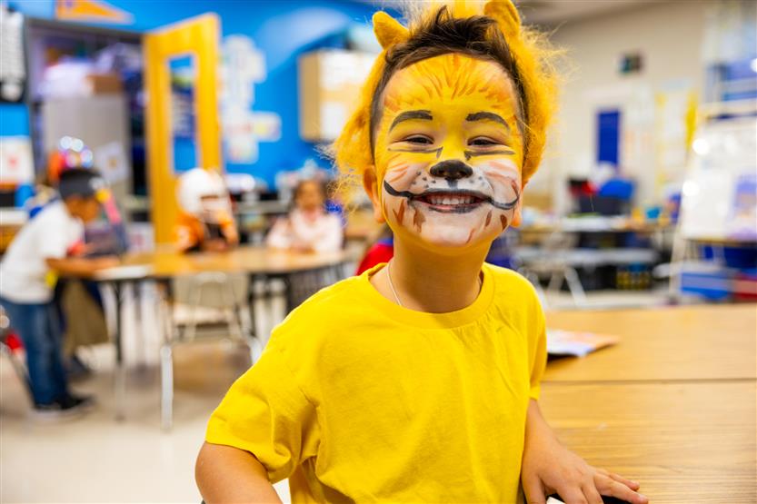 Students participate in an alphabet parade